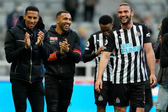 Andy Carroll with team-mates Isaac Hayden and Callum Wilson after Newcastle United's win over Sheffield United.