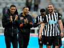 Andy Carroll with team-mates Isaac Hayden and Callum Wilson after Newcastle United's win over Sheffield United.