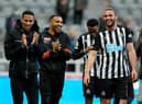 Andy Carroll with team-mates Isaac Hayden and Callum Wilson after Newcastle United's win over Sheffield United.
