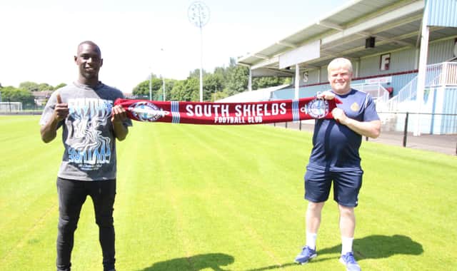 Ntumba Massanka and South Shields manager Graham Fenton.