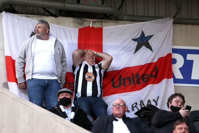 A Newcastle fan shows his frustration during the Premier League match between Newcastle United and Sheffield United at St. James Park on May 19, 2021 in Newcastle upon Tyne, England(Photo by Alex Pantling/Getty Images)