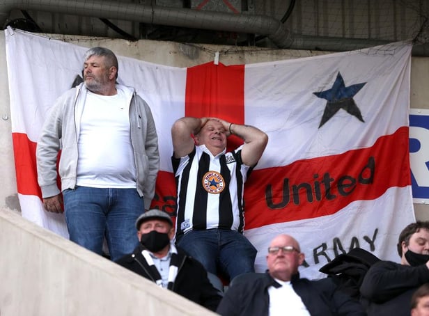 A Newcastle fan shows his frustration during the Premier League match between Newcastle United and Sheffield United at St. James Park on May 19, 2021 in Newcastle upon Tyne, England(Photo by Alex Pantling/Getty Images)