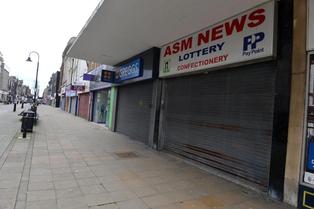 Shutters were down in the town centre as non-essential retail was ordered to close.