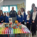 Toner Avenue Primary School pupils with some of the donated items, alongside Acting Headteacher, Claire Hutchinson, Year One teacher Tracey Finnigan, and Hebburn Helps Co-founder  Jo Durkin.