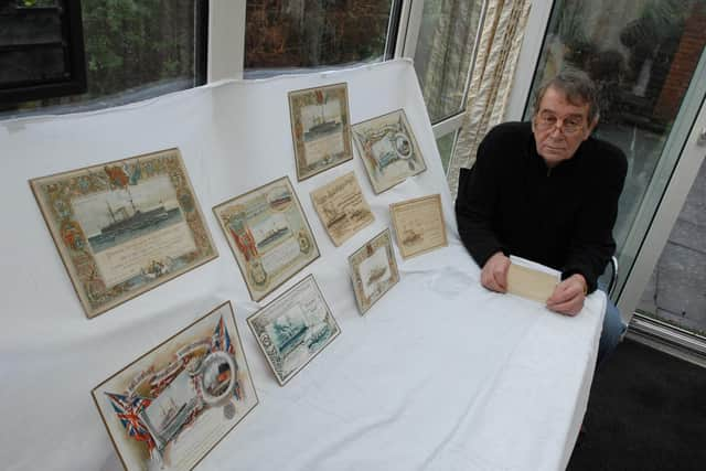 Vince pictured in 2008 with memorabilia related to the Jarrow March and Palmer's Shipyard.