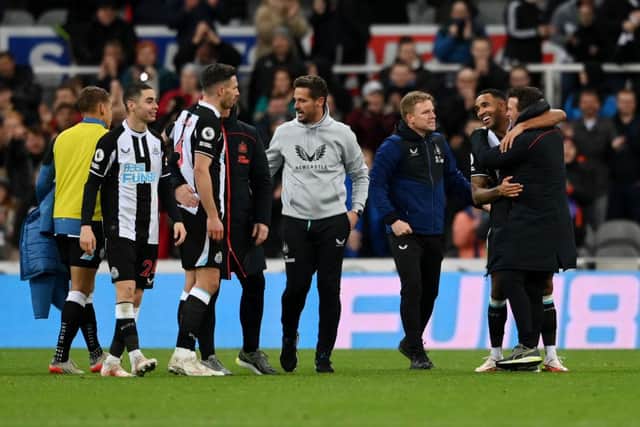 Callum Wilson of Newcastle United celebrates with Eddie Howe, Manager of Newcastle United after the Premier League match between Newcastle United and Burnley at St. James Park on December 04, 2021 in Newcastle upon Tyne, England. (Photo by Stu Forster/Getty Images)