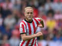 SUNDERLAND, ENGLAND - JULY 31: Sunderland player Alex Pritchard in action during the Sky Bet Championship between Sunderland and Coventry City at Stadium of Light on July 31, 2022 in Sunderland, England. (Photo by Stu Forster/Getty Images)