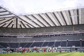 NEWCASTLE UPON TYNE, ENGLAND - JULY 26: A General view of play during the Premier League match between Newcastle United and Liverpool FC at St. James Park on July 26, 2020 in Newcastle upon Tyne, England. Football Stadiums around Europe remain empty due to the Coronavirus Pandemic as Government social distancing laws prohibit fans inside venues resulting in games being played behind closed doors. (Photo by Laurence Griffiths/Getty Images)