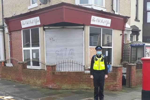 Community Support Officer Callum Thompson outside the Old Post Office on Broughton Road