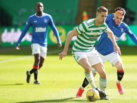Ajer of Celtic vies with Ianis Hagi of Rangers during the Ladbrokes Scottish Premiership match between Celtic and Rangers at Celtic Park.