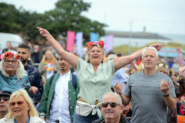 Music fans singing along to some of the classic 80s tunes.