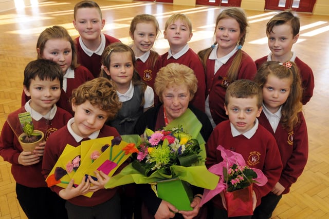 Retiring Valley View Primary School dinner lady Pat Nellist received gifts from members of the school council in 2014.