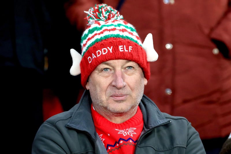 A fan in the Bramall Lane stands wearing a Daddy Elf hat on Boxing Day, 2019