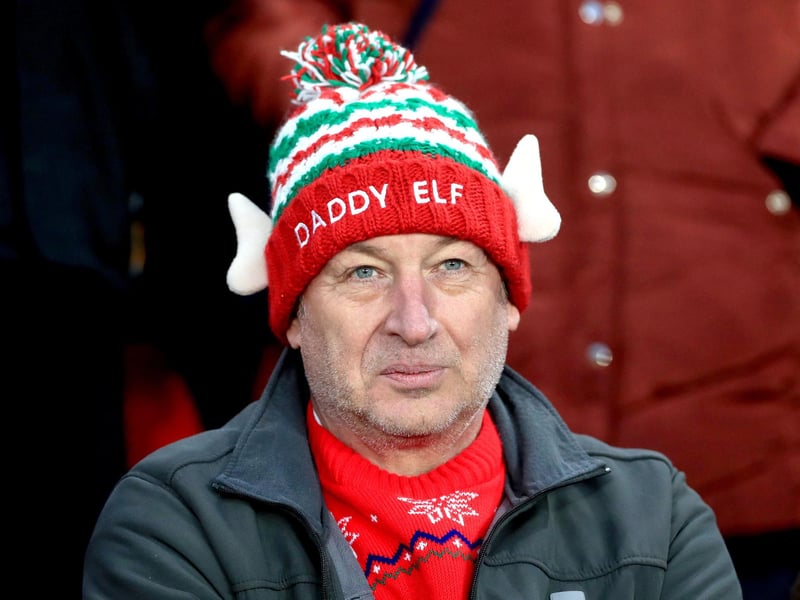 A fan in the Bramall Lane stands wearing a Daddy Elf hat on Boxing Day, 2019