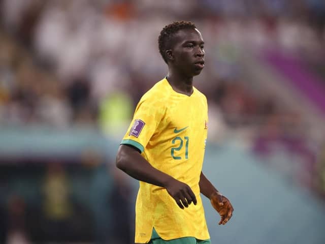 Garang Kuol of Australia looks on during the FIFA World Cup Qatar 2022 Round of 16 match between Argentina and Australia at Ahmad Bin Ali Stadium on December 03, 2022 in Doha, Qatar. (Photo by Robert Cianflone/Getty Images for Football Australia)