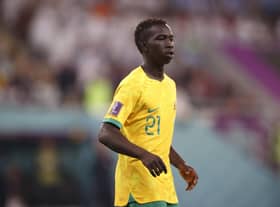 Garang Kuol of Australia looks on during the FIFA World Cup Qatar 2022 Round of 16 match between Argentina and Australia at Ahmad Bin Ali Stadium on December 03, 2022 in Doha, Qatar. (Photo by Robert Cianflone/Getty Images for Football Australia)