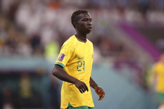 Garang Kuol of Australia looks on during the FIFA World Cup Qatar 2022 Round of 16 match between Argentina and Australia at Ahmad Bin Ali Stadium on December 03, 2022 in Doha, Qatar. (Photo by Robert Cianflone/Getty Images for Football Australia)