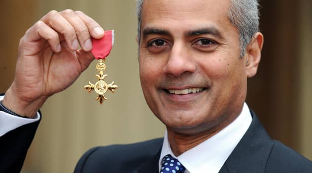 George Alagiah at Buckingham Palace after collecting his OBE from the Queen.