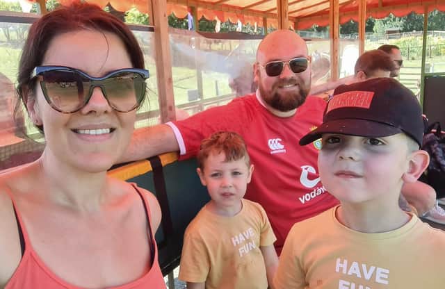 Nikola with sons Harry and Bobby and husband Paul