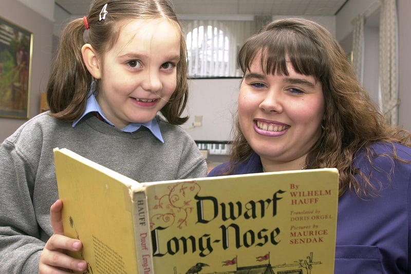 Sadie Chessman, aged 25, who is gave up some of her time to help children to read in February 2001. Here she's pictured with Jessica Lonie, aged seven. Sadie, secretary at Yorkshire Forward, South Parade, Doncaster, helps out at Nightingale Primary School, Balby.