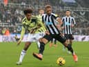 Leeds United's US midfielder Tyler Adams (L) vies with Newcastle United's Brazilian striker Joelinton during the English Premier League football match between Newcastle United and Leeds United at St James' Park in Newcastle-upon-Tyne, north east England on December 31, 2022. (Photo by LINDSEY PARNABY/AFP via Getty Images)
