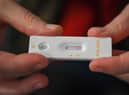 Rules for those who are doubled-jabbed and who have been in contact with a person who tests positive for Covid are set to change. Picture: Getty Images.