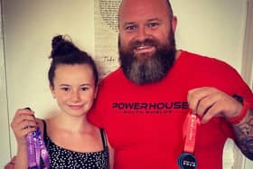 Graham Erickson and his daughter Nicole after they completed their first GNR challenges.