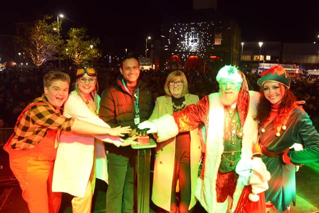 From left: Custom House characters Dennis and Achoo, "Local Hero" Dr Mickey Jachuck, Mayoress Jean Copp, Santa Claus and his elf.