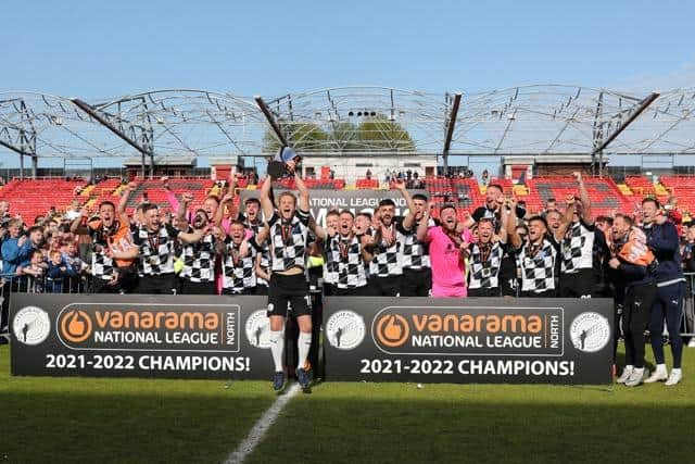 Greg Olley lifts the National League North trophy for Gateshead FC (photo: Charles Waugh).