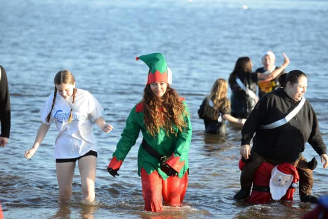 Jade Thirlwall, centre, braves the cold for the Cancer Connections Boxing Day Dip