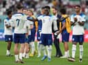 England's Bukayo Saka with Jack Grealish following the FIFA World Cup Group B match at the Khalifa International Stadium, Doha.