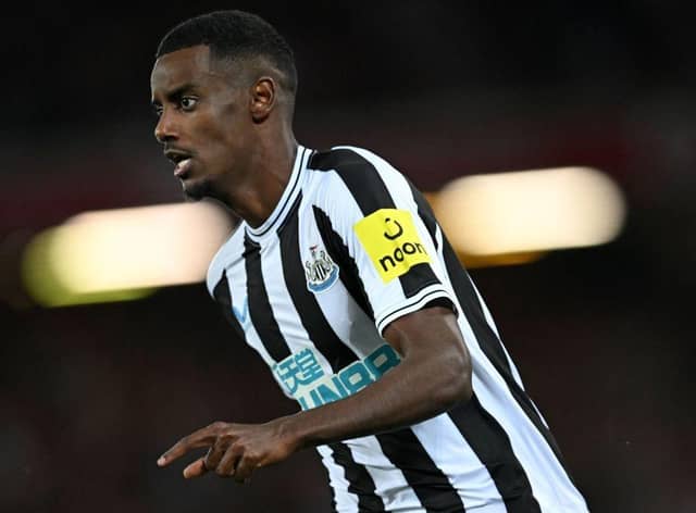 Newcastle United striker Alexander Isak chases the ball at Anfield.