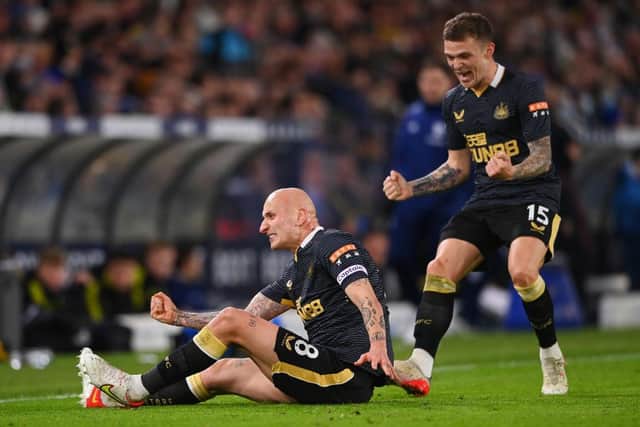 Jonjo Shelvey celebrates with Kieran Trippier of Newcastle United after scoring their team's first goal during the Premier League match between Leeds United and Newcastle United at Elland Road on January 22, 2022 in Leeds, England. (Photo by Stu Forster/Getty Images)