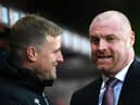Eddie Howe talks to Sean Dyche during a match between Burnley and Bournemouth (Photo by Dan Mullan/Getty Images)