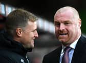 Eddie Howe talks to Sean Dyche during a match between Burnley and Bournemouth (Photo by Dan Mullan/Getty Images)