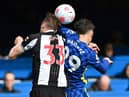 Newcastle United's English defender Dan Burn (L) vies in the air with Chelsea's German midfielder Kai Havertz during the English Premier League football match between Chelsea and Newcastle United at Stamford Bridge in London on March 13, 2022. (Photo by JUSTIN TALLIS/AFP via Getty Images)