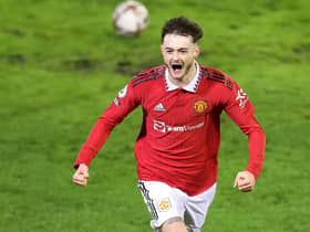 LEIGH, ENGLAND - JANUARY 14: Joe Hugill of Manchester United celebrates after scoring the team's second goal during the Premier League 2 match between Manchester United U21 and Liverpool U21 at Leigh Sports Village on January 14, 2023 in Leigh, England. (Photo by Manchester United/Manchester United via Getty Images)