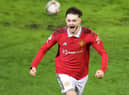 LEIGH, ENGLAND - JANUARY 14: Joe Hugill of Manchester United celebrates after scoring the team's second goal during the Premier League 2 match between Manchester United U21 and Liverpool U21 at Leigh Sports Village on January 14, 2023 in Leigh, England. (Photo by Manchester United/Manchester United via Getty Images)