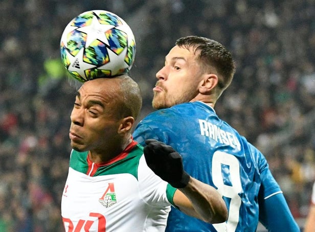 Lokomotiv Moscow's Portuguese midfielder Joao Mario and Juventus' Welsh midfielder Aaron Ramsey vie for the ball during the UEFA Champions League group D football match between FC Lokomotiv Moscow and Juventus at Moscow's RZD Arena stadium on November 6, 2019. (Photo by Dimitar DILKOFF / AFP) (Photo by DIMITAR DILKOFF/AFP via Getty Images)