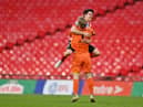 Lee Burge of Sunderland celebrates victory with teammate Luke O'Nien following the Papa John's Trophy Final match between Sunderland and Tranmere Rovers.
