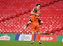 Lee Burge of Sunderland celebrates victory with teammate Luke O'Nien following the Papa John's Trophy Final match between Sunderland and Tranmere Rovers.