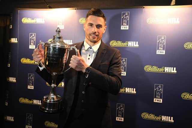Fabian Schar with the North East Football Writers' Association's player of the year award in February 2020.