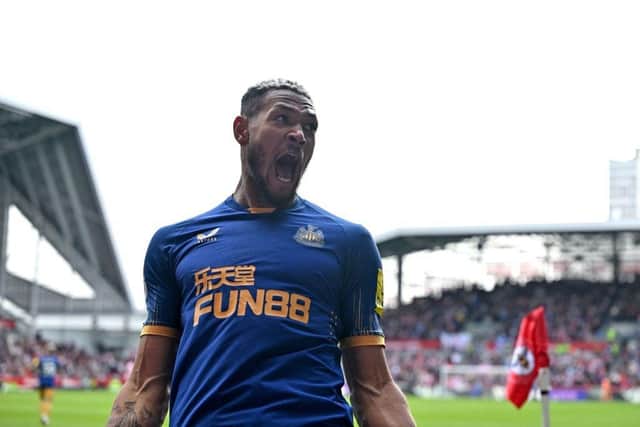 Newcastle United's Brazilian striker Joelinton celebrates their equalising goal during the English Premier League football match between Brentford and Newcastle United at Gtech Community Stadium in London on April 8, 2023. (Photo by Glyn KIRK / AFP)