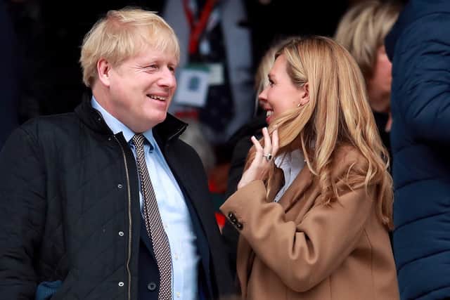 Prime Minister Boris Johnson and partner Carrie Symonds. Picture: Adam Davy/PA Wire.