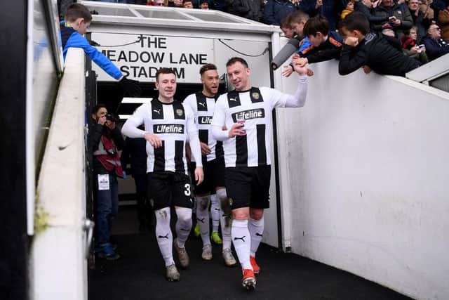 Kristian Dennis and Callum Roberts of Notts County (Photo by Laurence Griffiths/Getty Images).