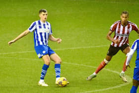 Kell Watts in action for Wigan Athletic.