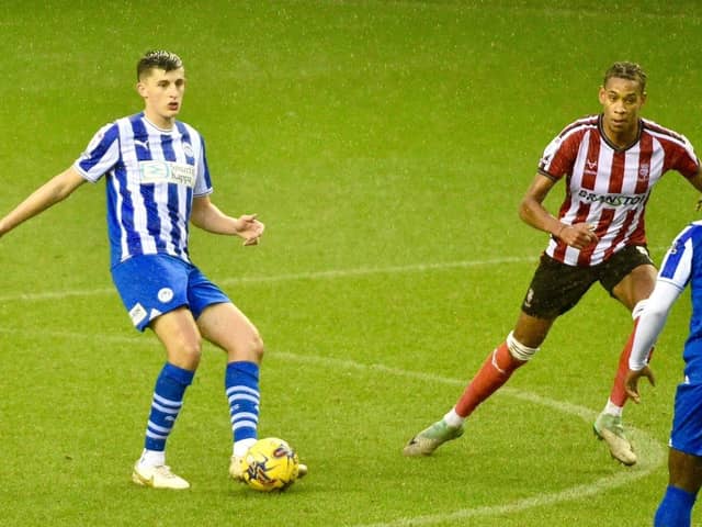 Kell Watts in action for Wigan Athletic.