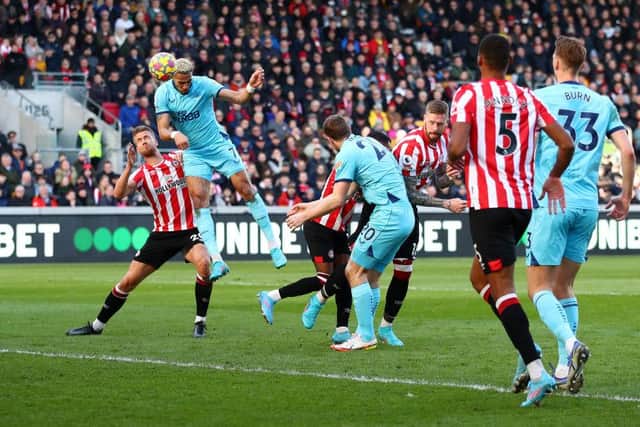 Joelinton of Newcastle United scores their team's first goal during the Premier League match between Brentford and Newcastle United at Brentford Community Stadium on February 26, 2022 in Brentford, England. (Photo by Marc Atkins/Getty Images)