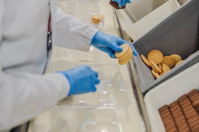 Packing biscuits on the production line at McVitie's Wigston factory (Picture: Patch Dolan/Channel 4)