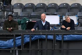 Former players and television presenters Micah Richards, Alan Shearer and Gary Lineker watch the match during the English FA Cup quarter-final football match between Newcastle United and Manchester City at St James' Park